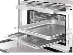 Компактный духовой шкаф с пароваркой Смег SF4750VCBS фото 4 в Челябинске Компактный духовой шкаф с пароваркой Smeg SF4750VCBS фото 4 в Челябинске