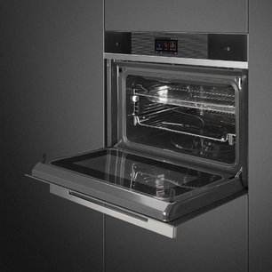 Компактный духовой шкаф с пароваркой Smeg SF4104WVCPN фото 4 в Челябинске