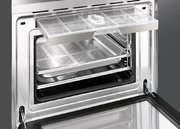 Компактный духовой шкаф с пароваркой Smeg SF4920VCN фото 3 в Челябинске