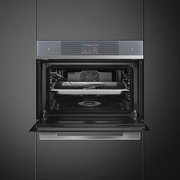 Компактный духовой шкаф с пароваркой Smeg SF4104WVCPS фото 4 в Челябинске