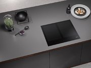 Индукционная панель конфорок с сенсорным управлением Miele KM7564 FL фото 3 в Челябинске