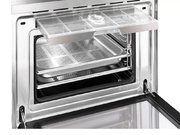 Компактный духовой шкаф с пароваркой Smeg SF4750VCBS фото 2 в Челябинске
