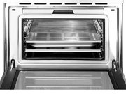 Компактный духовой шкаф с пароваркой Smeg SF4750VCBS фото 3 в Челябинске